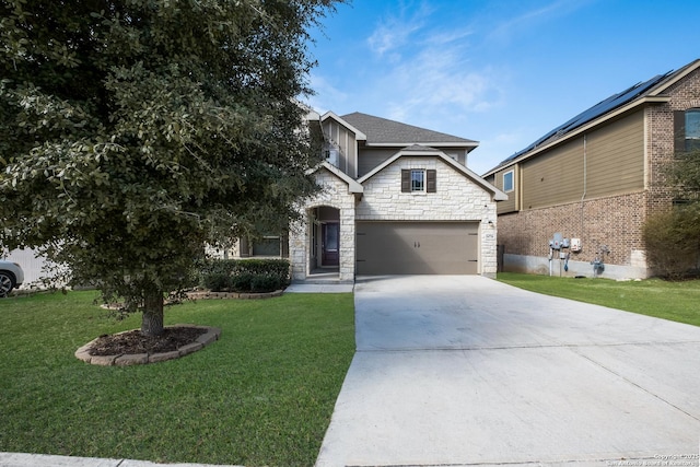 view of front of property featuring a garage, a front yard, stone siding, and driveway