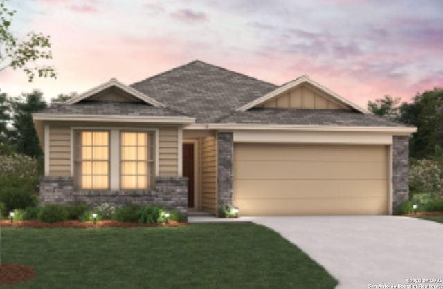 view of front of property with a garage, concrete driveway, a front lawn, and board and batten siding