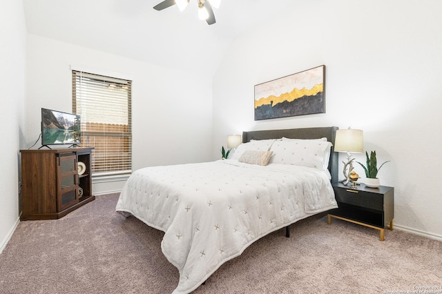 bedroom featuring lofted ceiling, carpet flooring, a ceiling fan, and baseboards