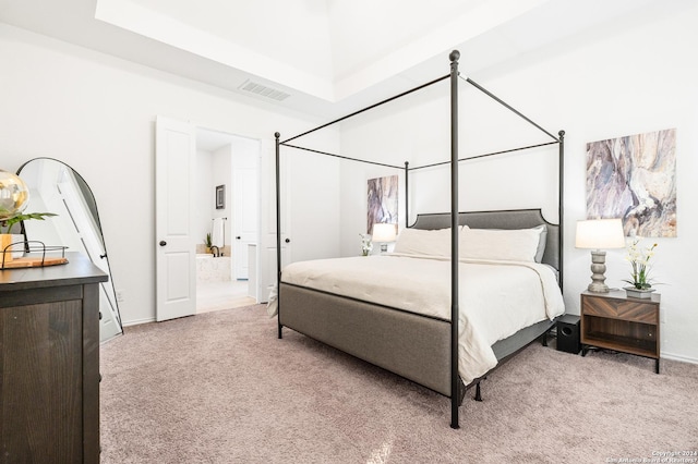 bedroom with carpet, visible vents, and baseboards