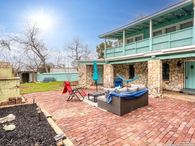 view of patio / terrace featuring a balcony and an outdoor hangout area