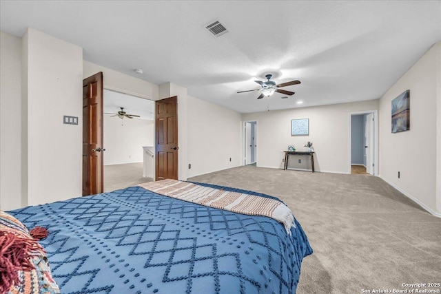 bedroom with a ceiling fan, visible vents, and carpet flooring