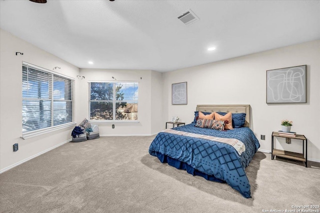 bedroom with carpet floors, baseboards, visible vents, and recessed lighting