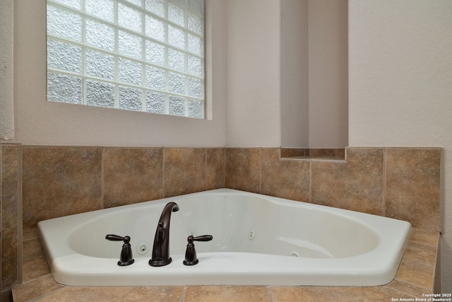 bathroom featuring a whirlpool tub