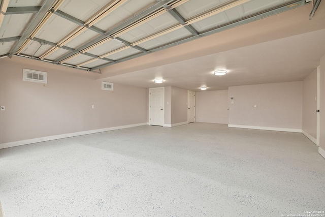 garage with baseboards