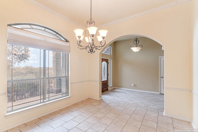 empty room with baseboards, arched walkways, crown molding, a notable chandelier, and light tile patterned flooring