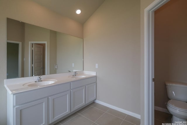 10314 Tule Creek Frk, San Antonio, TX 78252 - bathroom featuring double vanity and tile patterned floors