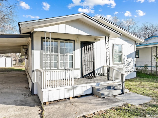 exterior space featuring a carport