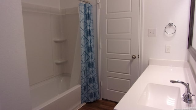 10643 W Military, San Antonio, TX 78251 - full bath featuring wood finished floors, vanity, and shower / tub combo with curtain