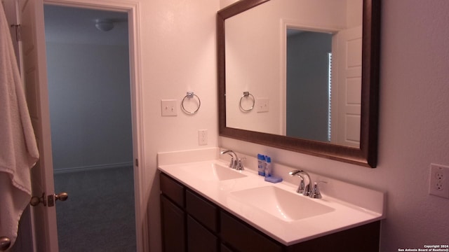 10643 W Military, San Antonio, TX 78251 - full bath featuring double vanity and a sink