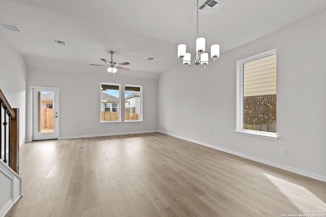 unfurnished living room featuring light wood-type flooring, baseboards, and visible vents