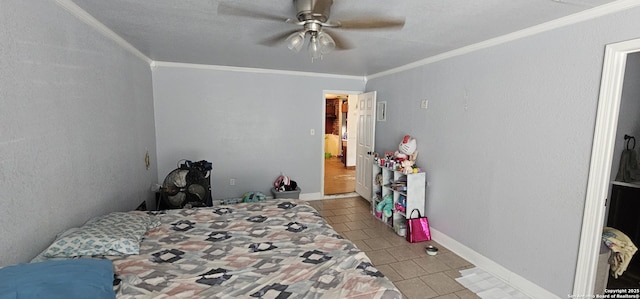 bedroom with light tile patterned floors, ornamental molding, a ceiling fan, and baseboards