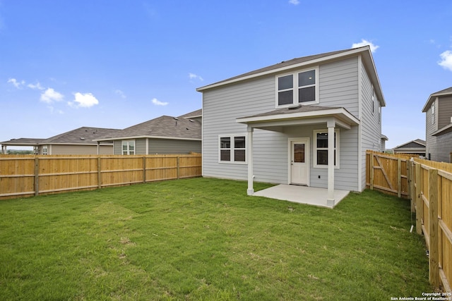 back of house featuring a patio area