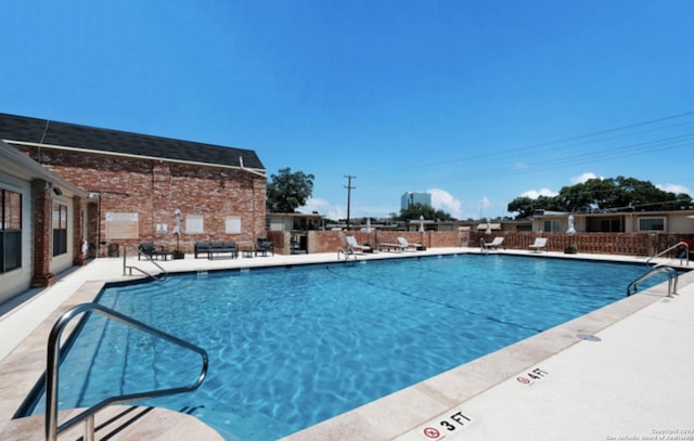 community pool with fence