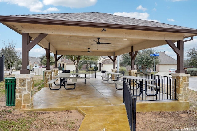 view of home's community featuring fence and a patio