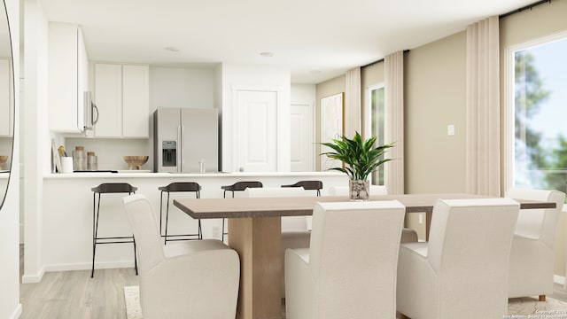 dining room featuring light wood-type flooring