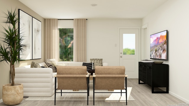 living room featuring light wood-type flooring and baseboards