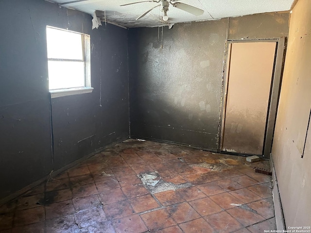 empty room with ceiling fan