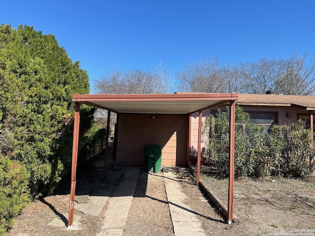 view of parking with a carport