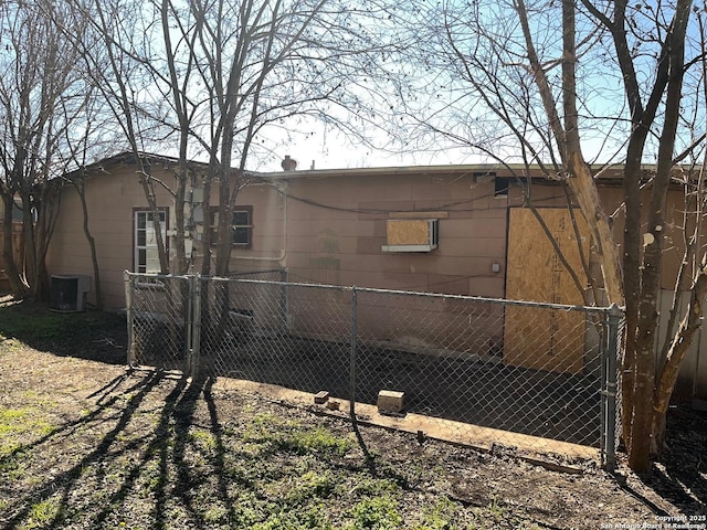 view of property exterior featuring fence