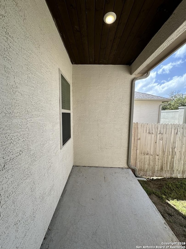 view of patio with fence