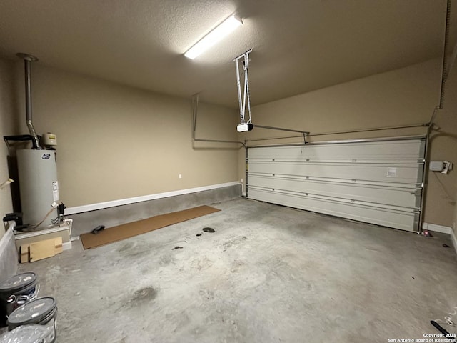 garage featuring a garage door opener, gas water heater, and baseboards