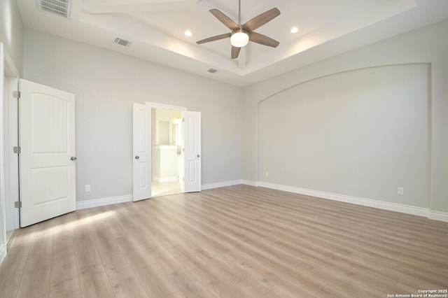 unfurnished bedroom with light wood finished floors, baseboards, visible vents, and recessed lighting