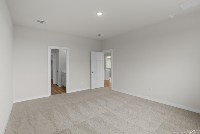 4338 Clarisse St, New Braunfels, TX 78130 - unfurnished bedroom featuring carpet flooring, baseboards, recessed lighting, and connected bathroom