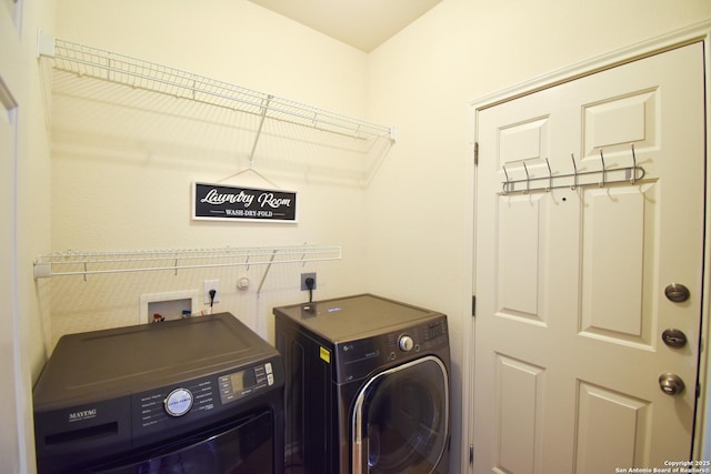 laundry area with laundry area and washing machine and clothes dryer