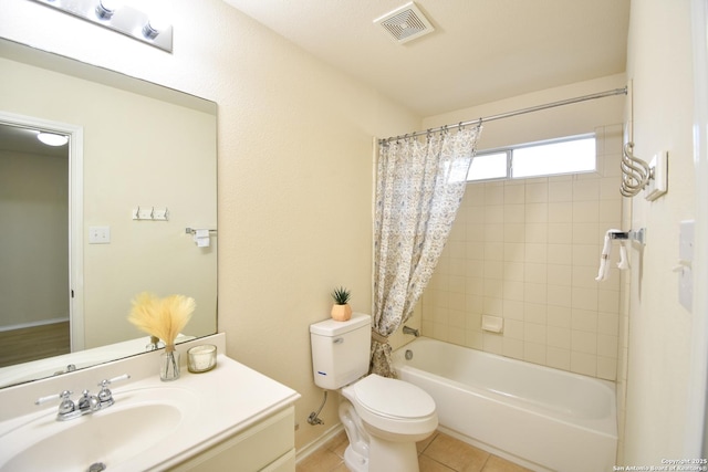 bathroom with tile patterned flooring, toilet, shower / tub combo, vanity, and visible vents