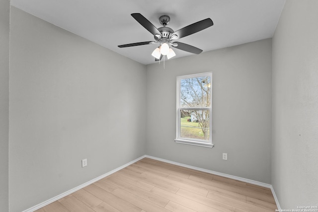 unfurnished room with light wood-type flooring, ceiling fan, and baseboards