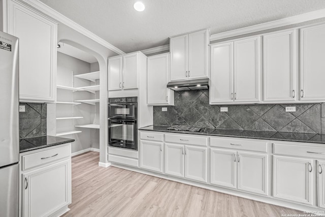 kitchen featuring open shelves, appliances with stainless steel finishes, white cabinetry, light wood-type flooring, and under cabinet range hood