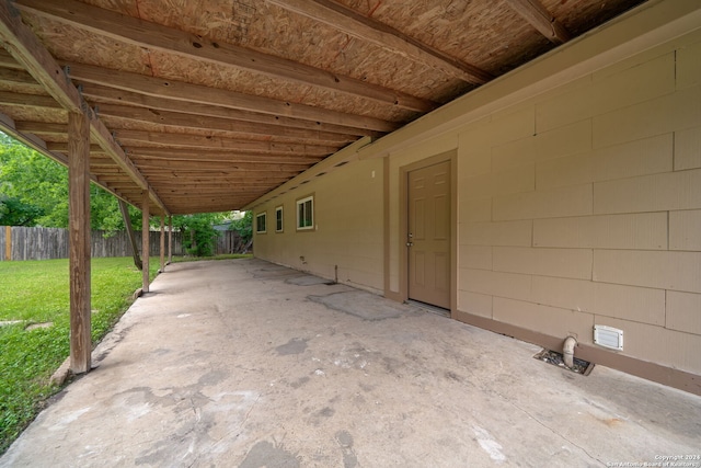 view of patio featuring fence