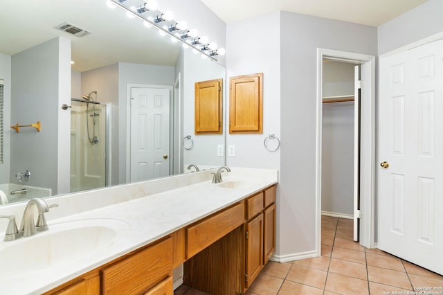 full bath featuring tile patterned flooring, visible vents, a sink, and double vanity