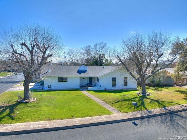 view of front of house with a front yard