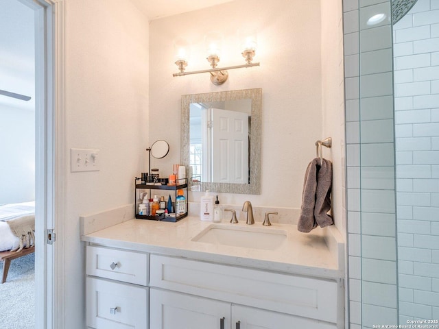 bathroom featuring connected bathroom and vanity