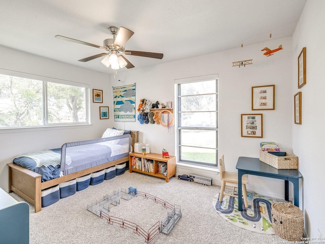 bedroom featuring carpet and a ceiling fan