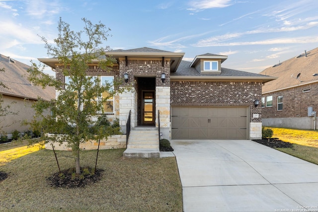 view of front of property with a front yard, stone siding, brick siding, and driveway