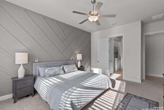 bedroom with light carpet, a ceiling fan, visible vents, and baseboards