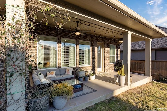 view of patio / terrace featuring fence and an outdoor hangout area