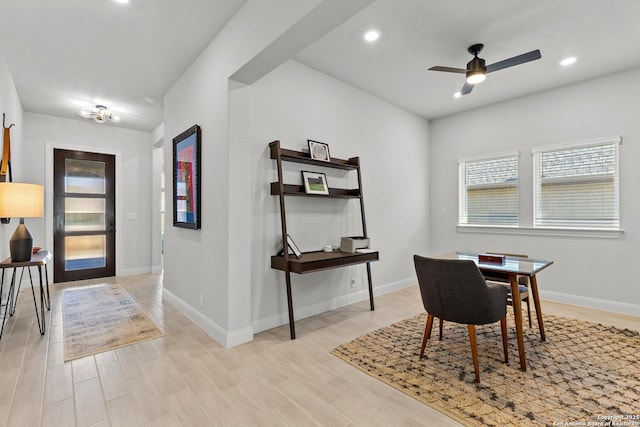 dining space with baseboards, recessed lighting, a ceiling fan, and light wood-style floors