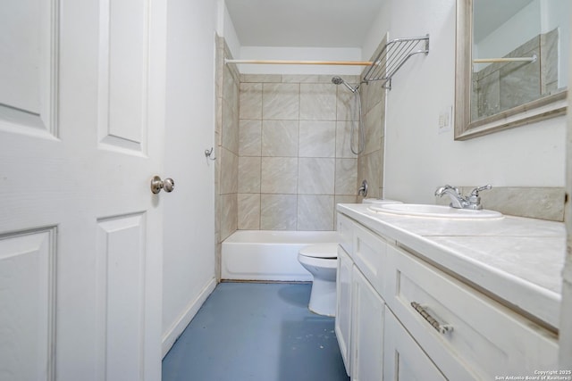 full bathroom with toilet, vanity, baseboards, finished concrete flooring, and tub / shower combination