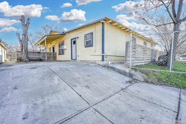 view of front of home with fence