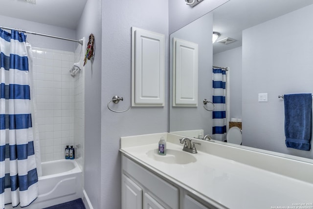 full bath featuring visible vents, shower / bathtub combination with curtain, and vanity