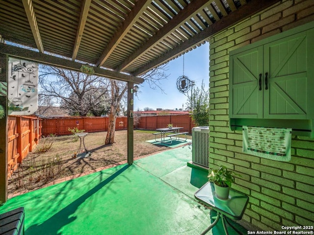 view of patio / terrace featuring central air condition unit, a fenced backyard, and a pergola