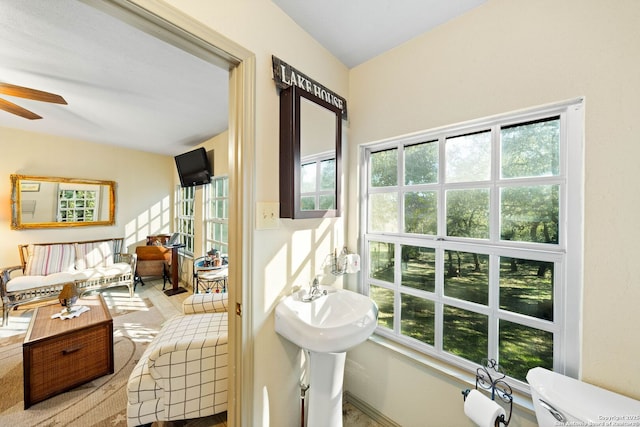 interior space featuring a ceiling fan