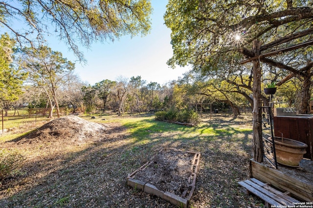 view of yard featuring fence