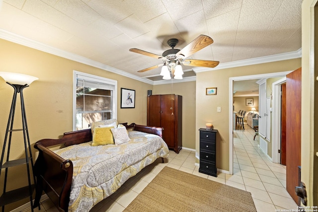 bedroom featuring light tile patterned flooring, crown molding, baseboards, and ceiling fan