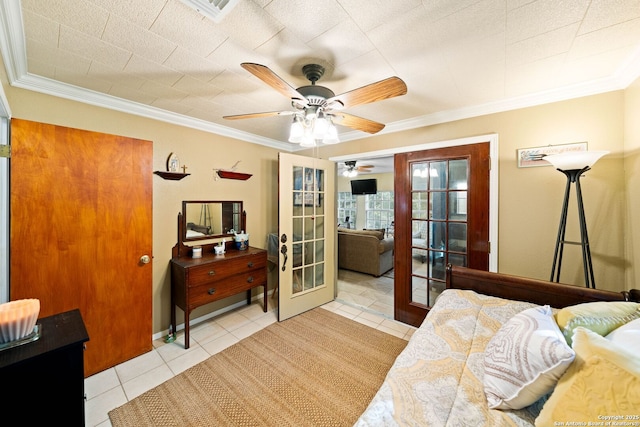 bedroom featuring light tile patterned floors, ornamental molding, and french doors