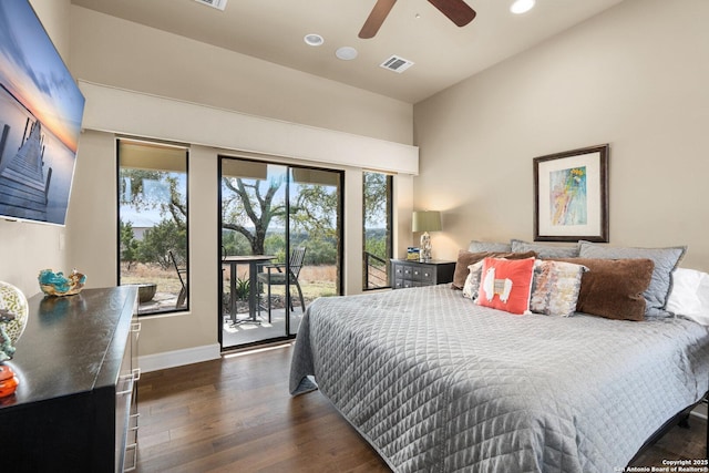 bedroom with recessed lighting, dark wood-type flooring, visible vents, baseboards, and access to outside